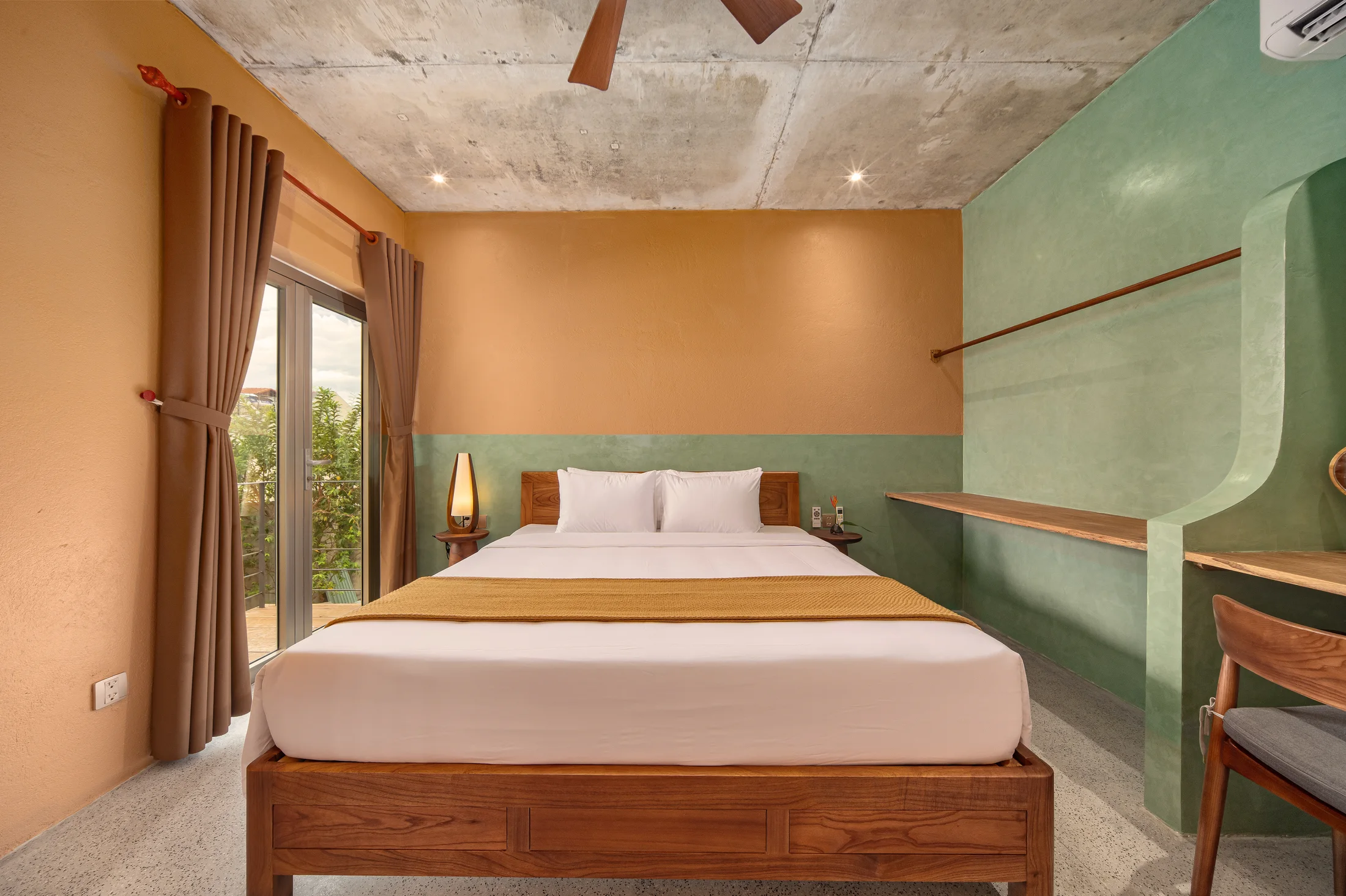 King bedroom with terracotta and sage walls